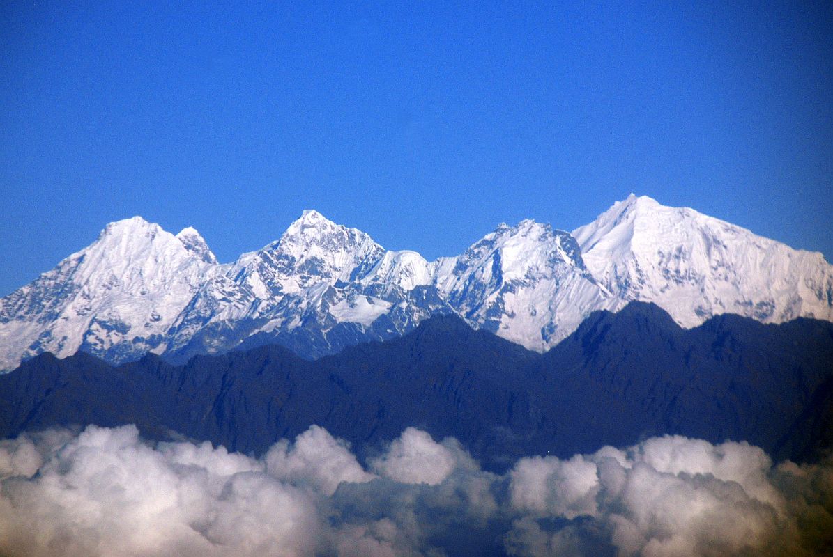 Kathmandu Mountain Flight 02-1 Ganesh Himal The first mountains you see on the Kathmandu Mountain Flight as you look to the west are the summits of Ganesh Himal, from Ganesh V on the left to Ganesh I on the right. Ganesh II is sticking out to the right of Ganesh V.